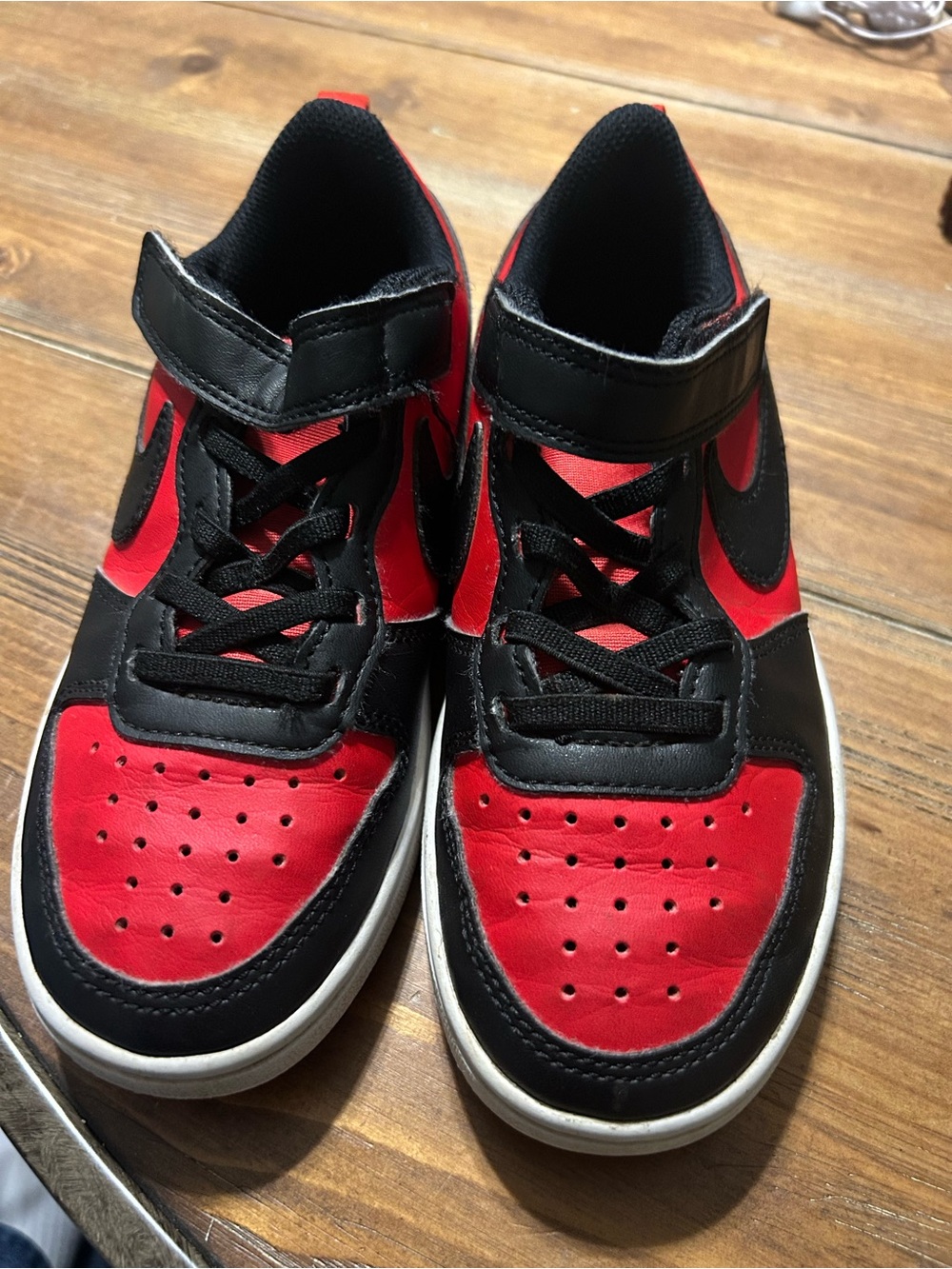 Kids Nikes in Red and Black size 13C